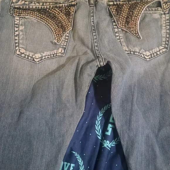 Women's Distressed Blue Jeans